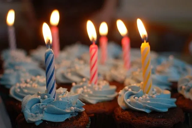 Birthday cupcakes with lit candles