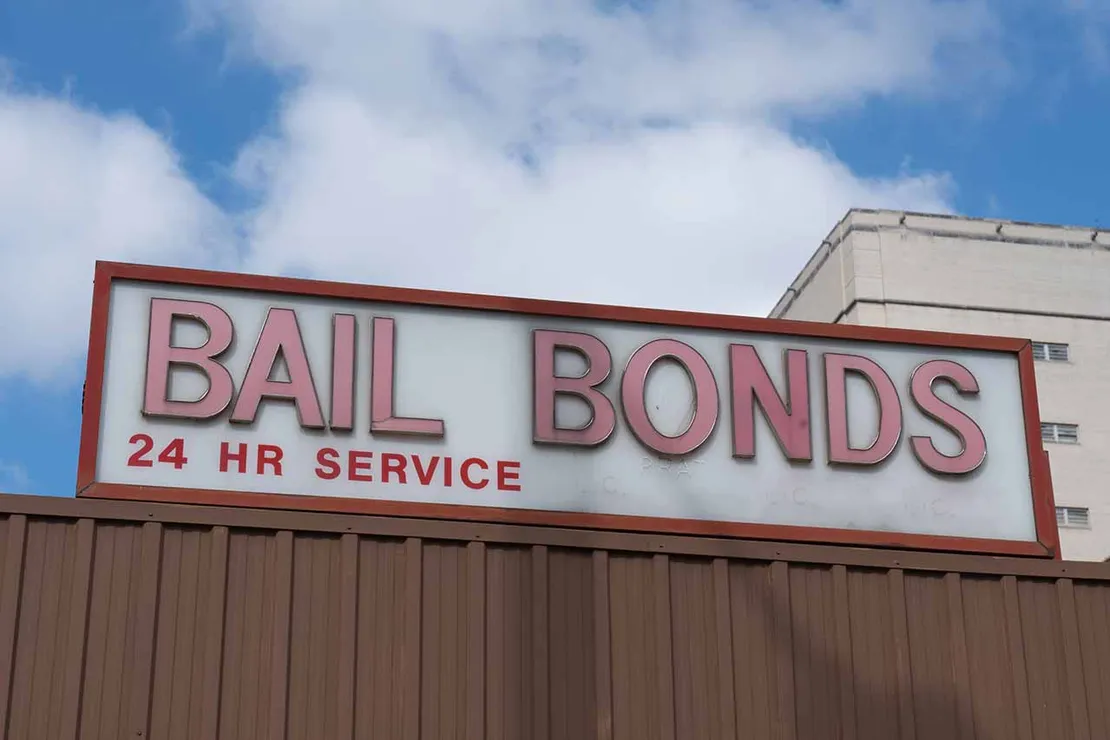 A bail bonds sign advertising 24-hour service