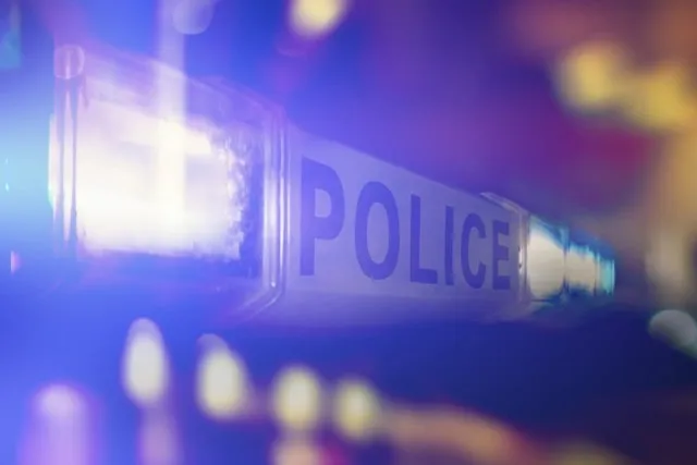 The light bar of a police car at night